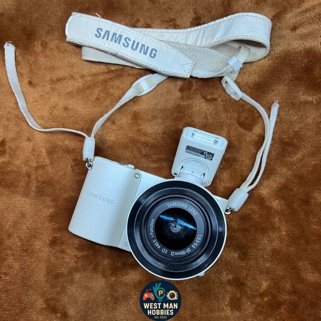 Samsung NX1000 camera (Category: Cameras) located in Talavera. Submitted by westmanhobbies-2022 (Listing ID 1468928972, Image 2). Description: Samsung NX1000 budgetmeal mirrorless (Preloved) 20mp 20/50mm lens working af Pop up flash with wifi 9.3/10 body condition (sellers rate) All buttons working Sample shots posted - lens aperture not working hirap mag focus sa madilim, walang problema sa outdoor maganda ang shots! 😊 pwede mo palitan lens or 