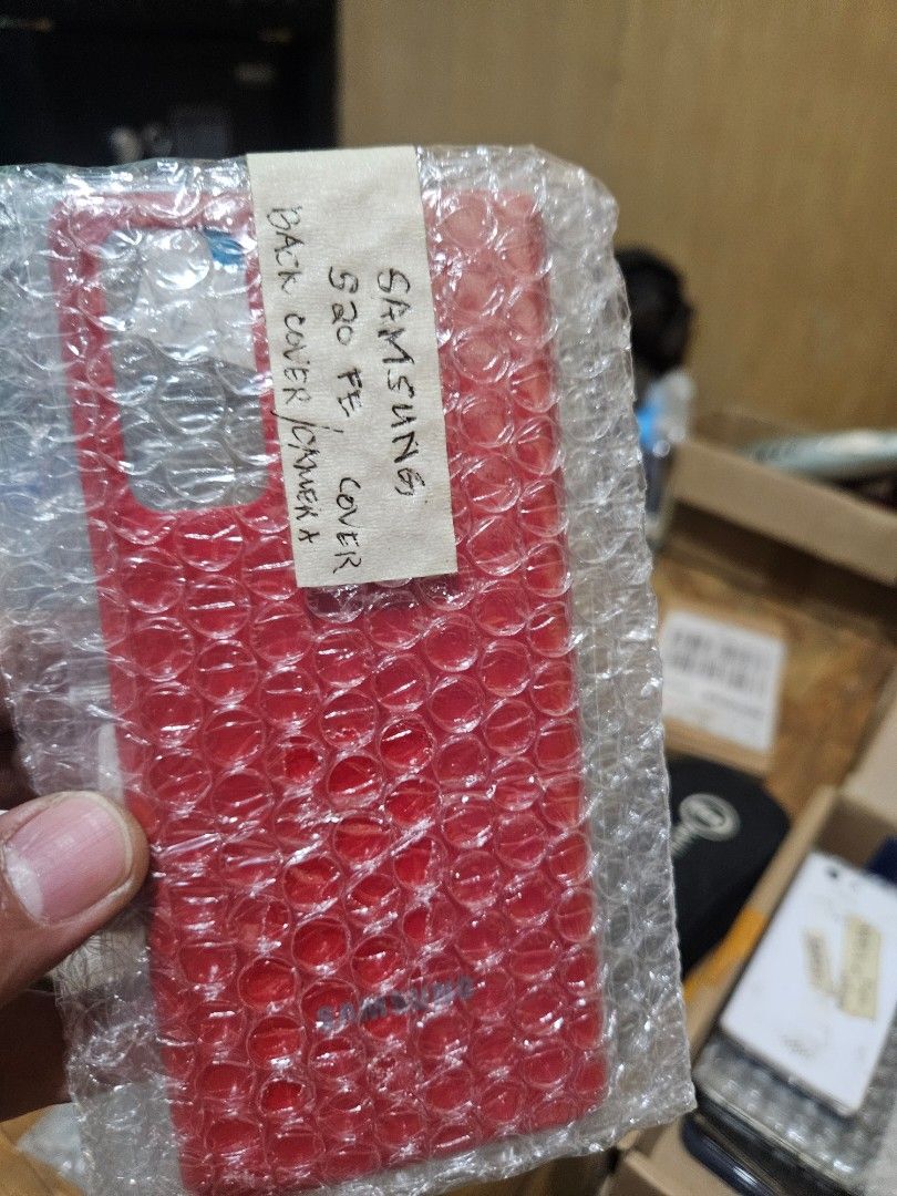 Samsung S20 FE back cover with camera Lens cover (Category: Cases & Sleeves) located in Quezon City. Submitted by kizuke (Listing ID 1468905253, Image 2). Description: Samsung S20 FE back cover (red) with camera lens cover.brandnew.