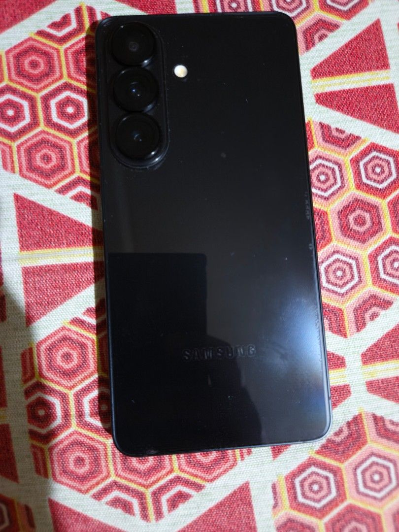 Samsung S26, 512GB (Category: Samsung) located in Cabanatuan. Submitted by cdrcbv (Listing ID 1468930136, Image 2). Description: FOR SALE: Samsung Galaxy S26 (Base Model) Model: Samsung Galaxy S26 (Base), Color: Dark Matte Gray Warranty: Until March 2026 Unit: NTC-Approved Network: Factory Unlocked Inclusions: - Original box - Digital receipt - Charging cable Features: - Sleek and premium design - Compact and powerful flagship phone - Great for e