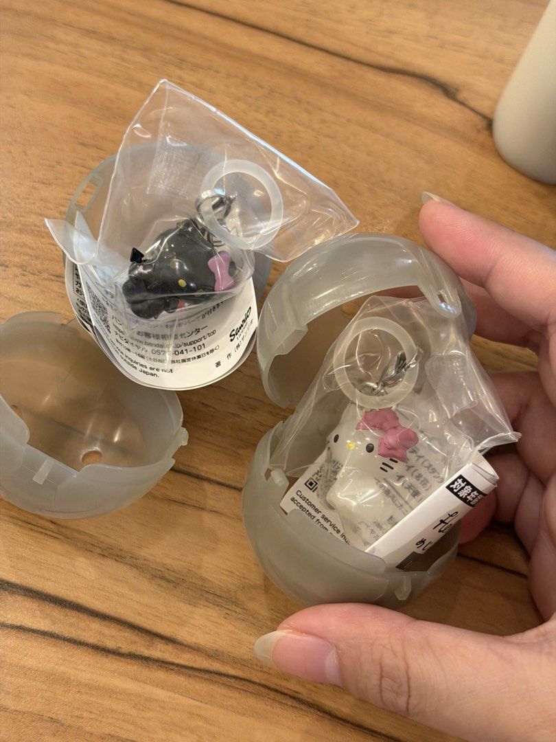 Sanrio Hello Kitty Gachapon Keychain (Category: Character Goods) located in Rizal. Submitted by alearchives (Listing ID 1468759086, Image 1). Description: Sanrio Hello Kitty Gachapon Keychains - Available: Black Devil HK or White Kitty - 250 PHP EACH + SF - 100% Brand new, unopened/sealed, with capsule case and paper -RFS: Dupe - Available for individual purchase or as a set—just send a message! - Loc: Eastwood or Tanay.