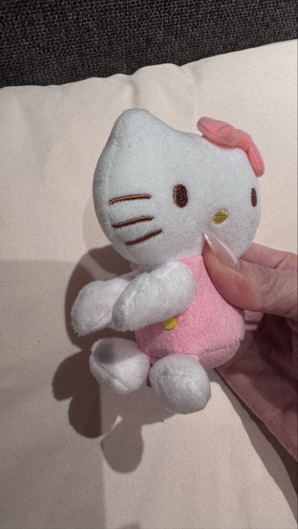 Sanrio Hello Kitty Huggable Plush Toy Pink (Category: Plushies & Soft Toys) located in Mandaluyong City. Submitted by maelovestoshop (Listing ID 1468870843, Image 3). Description: - Official 2022 Sanrio Kitty plush toy with tag - Features cute pink overalls and a matching pink bow - Made from ultra-soft fleece material - Huggable arms designed to grip onto mugs, cups, or handles - Excellent, very clean condition - Perfect collectible piece for Ki