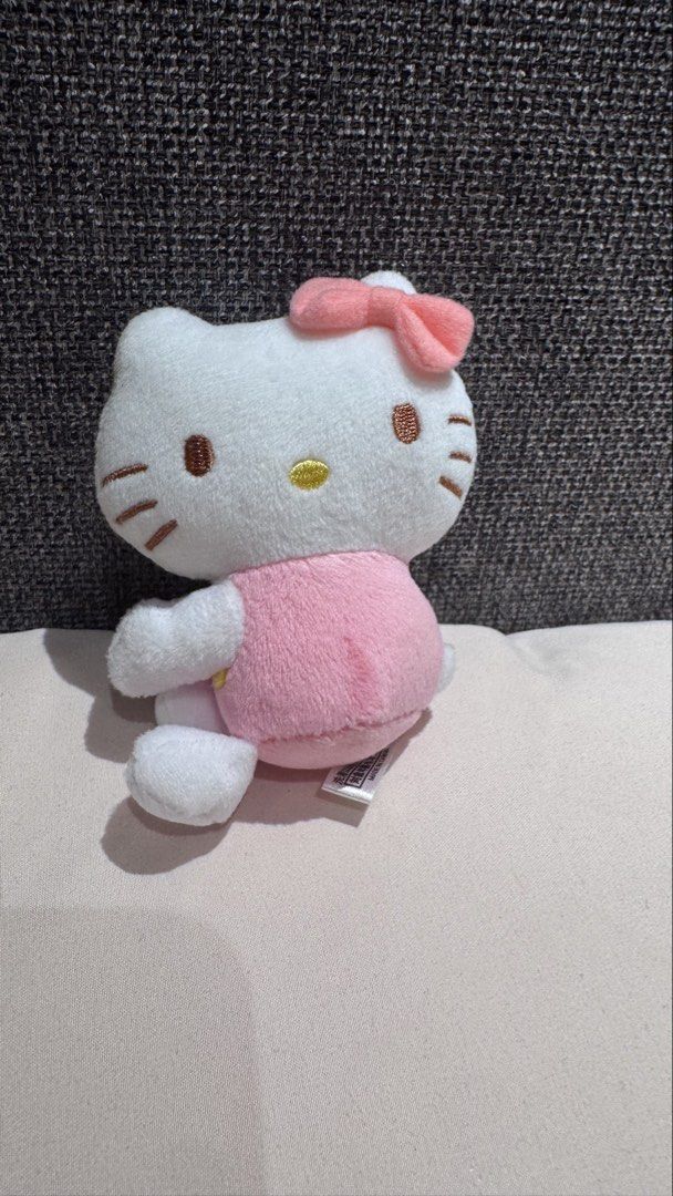Sanrio Hello Kitty Huggable Plush Toy Pink (Category: Plushies & Soft Toys) located in Mandaluyong City. Submitted by maelovestoshop (Listing ID 1468870843, Image 1). Description: - Official 2022 Sanrio Kitty plush toy with tag - Features cute pink overalls and a matching pink bow - Made from ultra-soft fleece material - Huggable arms designed to grip onto mugs, cups, or handles - Excellent, very clean condition - Perfect collectible piece for Ki