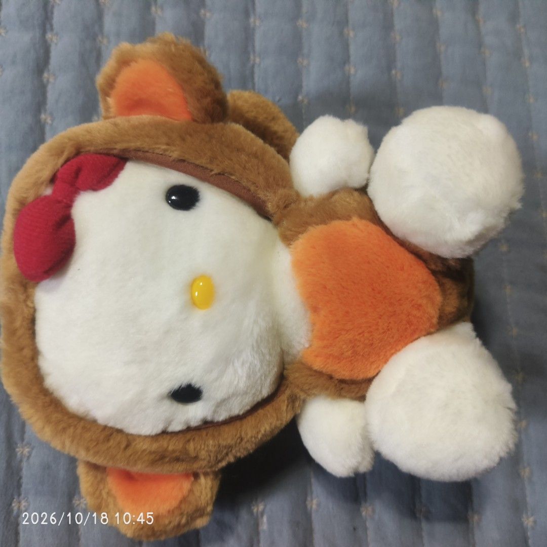 Sanrio Hello Kitty Monkey Costume Plush Toy Eikoh (Category: Plushies & Soft Toys) located in Manila. Submitted by nezukokamado19 (Listing ID 1468727482, Image 1). Description: - Sanrio Kitty plush wearing a cute brown monkey onesie with an orange belly - Features her signature red bow, white paws, and feet - Official Eikoh branding with Sanrio 1976, 2000 copyright tush tag attached - Clean fur and soft, huggable filling.