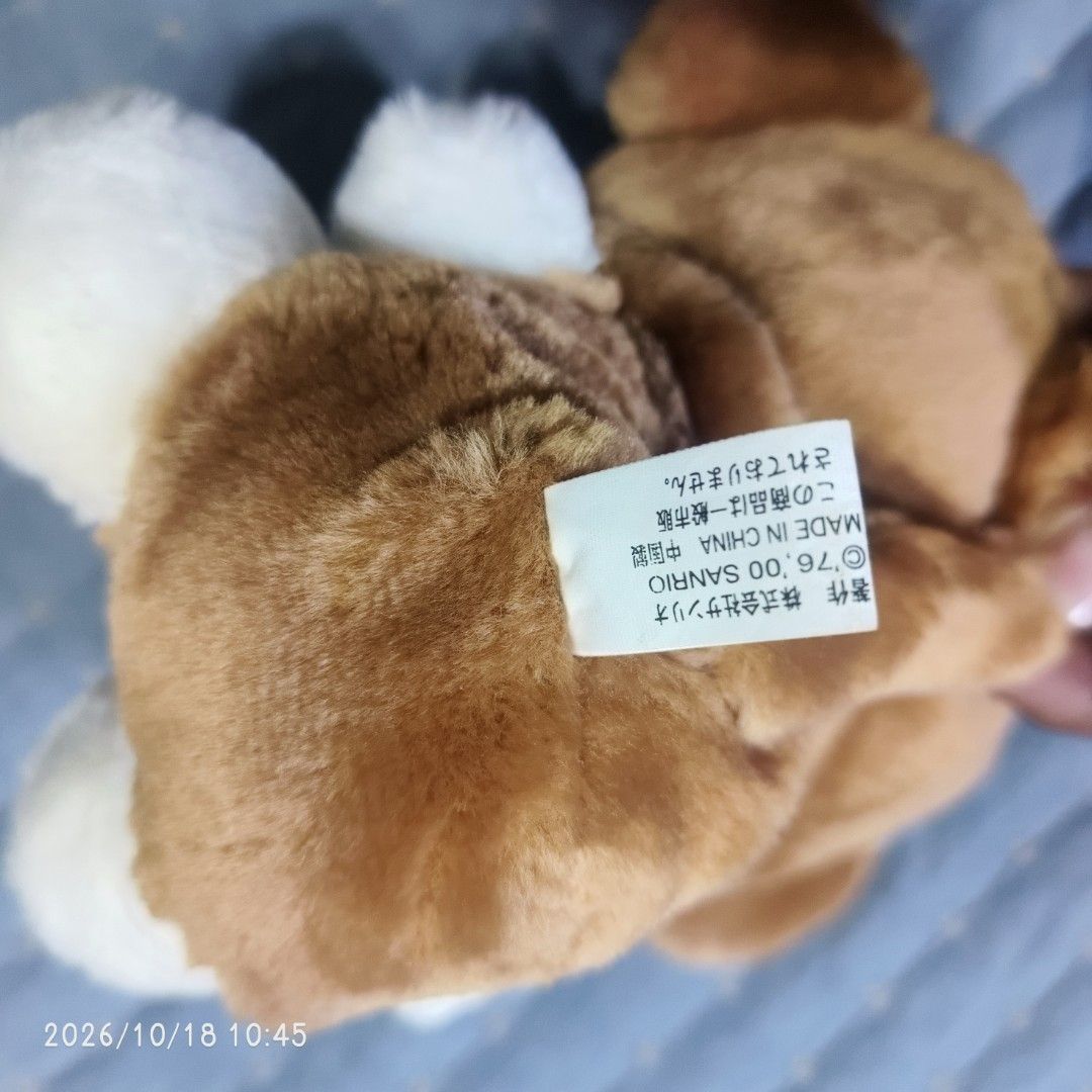 Sanrio Hello Kitty Monkey Costume Plush Toy Eikoh (Category: Plushies & Soft Toys) located in Manila. Submitted by nezukokamado19 (Listing ID 1468727482, Image 3). Description: - Sanrio Kitty plush wearing a cute brown monkey onesie with an orange belly - Features her signature red bow, white paws, and feet - Official Eikoh branding with Sanrio 1976, 2000 copyright tush tag attached - Clean fur and soft, huggable filling.