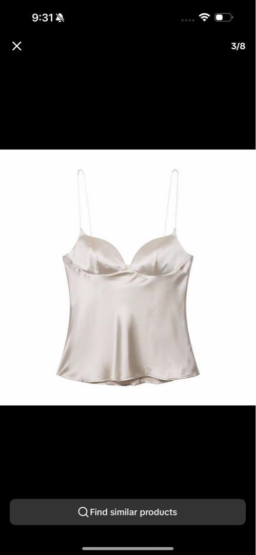 Satin camisole top with spaghetti straps (Category: Sleeveless) located in Manila. Submitted by lexxi.00 (Listing ID 1468855271, Image 1). Description: - Style: Champagne satin camisole top with a subtle sheen - Design: Sweetheart neckline with molded cups and delicate spaghetti straps - Fit: Standard fit - Versatility: Perfect for night outs, pairs easily with high-waisted jeans or skirts - Condition: Brand new / Excellent quality.