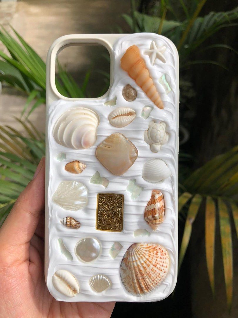 seashell beach iPhone 15 phonecase from iristella__ (Category: Cases & Sleeves) located in Quezon City. Submitted by chescita (Listing ID 1468747954, Image 2). Description: custom made never used cute for beach pics rfs: seller didn’t follow instructions when she designed this for me. not a fan of it *selling for the price I bought it.