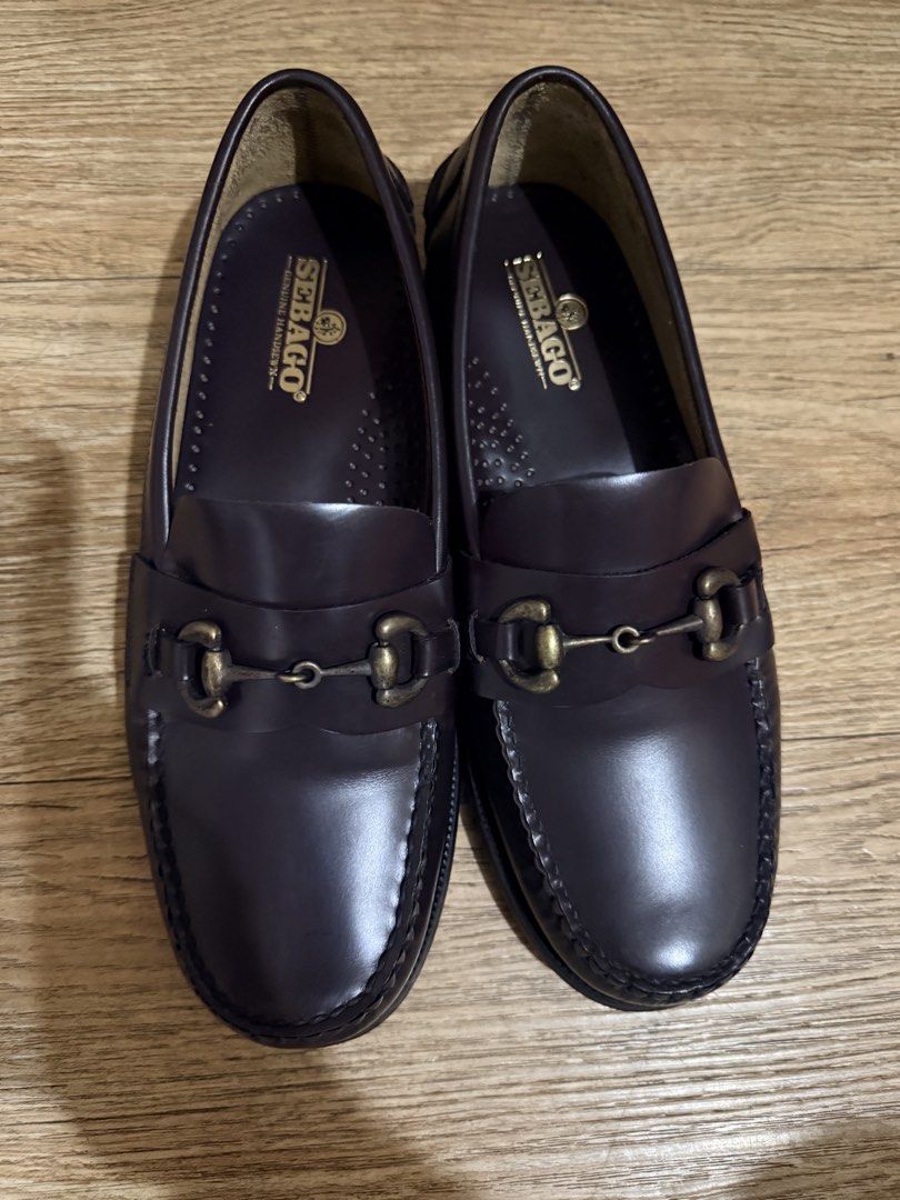 Sebago Loafers Dark Brown (Category: Dress Shoes) located in Pasig City. Submitted by thetravellingguyinstyle (Listing ID 1468789792, Image 1). Description: - Brand: Sebago - Color: Dark brown - Material: Genuine leather - Details: Antique brass horsebit hardware, handsewn construction, moc toe stitching - Condition: Soles and heels intact with minimal wear - Style: Slip-on, versatile for smart casual or formal outfits.