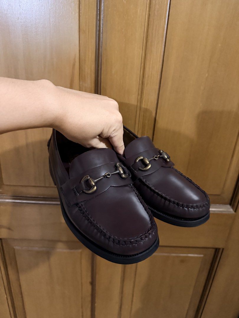 Sebago Loafers Dark Brown (Category: Dress Shoes) located in Pasig City. Submitted by thetravellingguyinstyle (Listing ID 1468789792, Image 2). Description: - Brand: Sebago - Color: Dark brown - Material: Genuine leather - Details: Antique brass horsebit hardware, handsewn construction, moc toe stitching - Condition: Soles and heels intact with minimal wear - Style: Slip-on, versatile for smart casual or formal outfits.