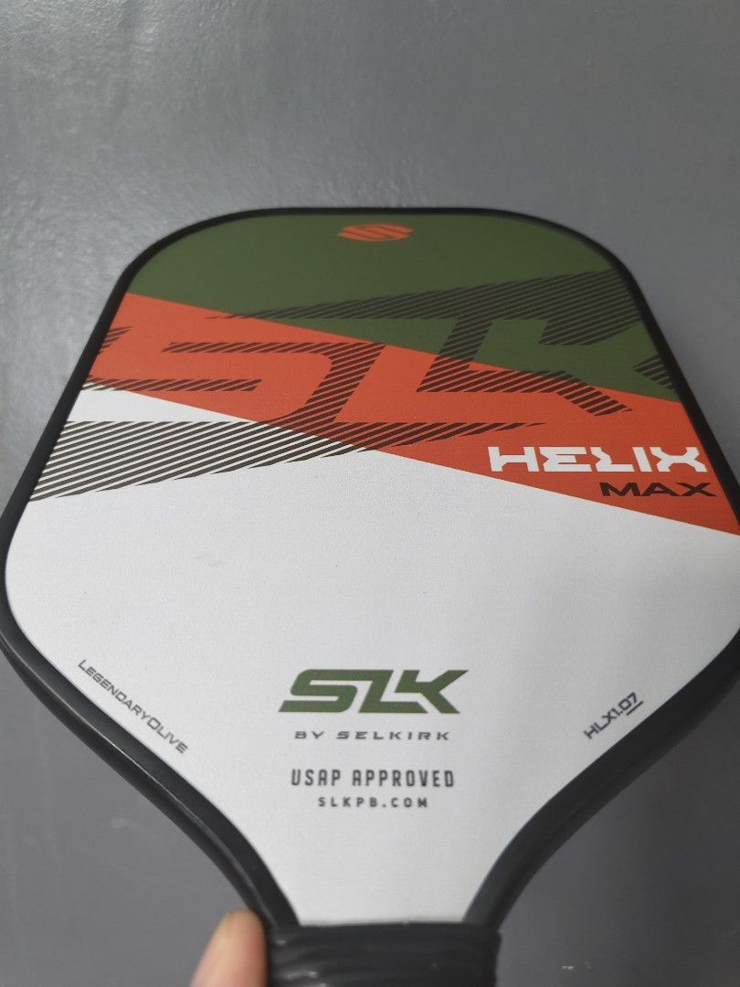Selkirk Helix Max (Category: Racket and Ball Sports) located in Quezon City. Submitted by rex130rex (Listing ID 1468717799, Image 2). Description: 2nd hand paddle Selkirk SLK Helix Max Php1500 (fixed) Meet up: BGC / Pasig / Cainta With edge guard scratches.