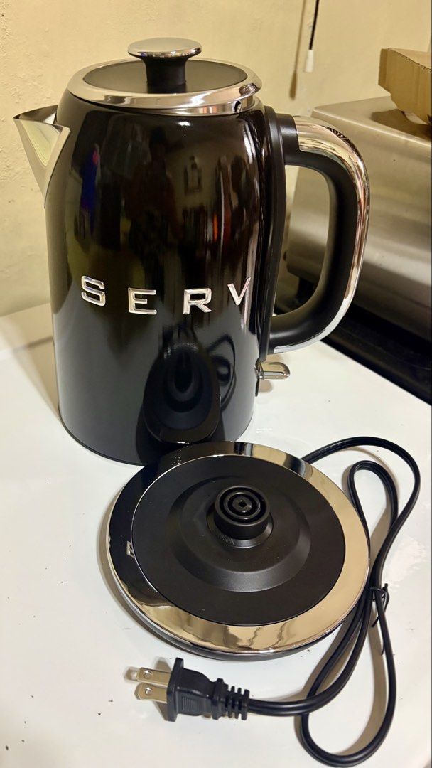 Servappetit Retro Electric Kettle Black (Category: Kettles & Airpots) located in Manila. Submitted by lizziedear.lizziedear (Listing ID 1468730630, Image 2). Description: - Brand: Servappetit retro electric kettle in sleek black - Interior: Durable stainless steel - Performance: Boils water fast for coffee or tea - Convenience: Removable power base and standard PH plug - Condition: Comes with original box - Capacity: 1.7 liter - Voltage: 120V-60g