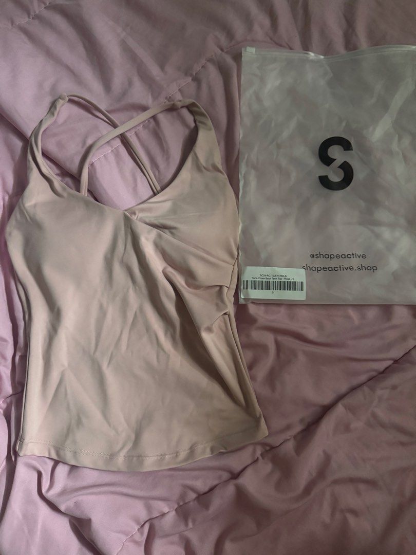 Shape Active Tone Cross Back Tank Top (Category: Activewear) located in Manila. Submitted by elqgbrl (Listing ID 1468762836, Image 3). Description: Shape Active Tone Cross Back Tank Top - Color: Rose - Size: Small (S) - Condition: Brand new, never worn - Comes in original ziplock storage bag with barcode tag Price on site: ₱1850, selling for ₱1350 but you can drop offers! .