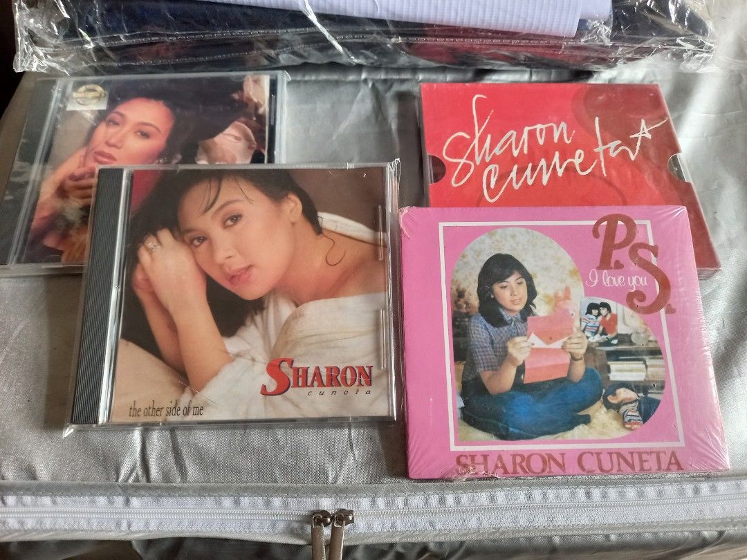 Sharon Cuneta Audio CDs Lot (Category: CDs & DVDs) located in Bacoor. Submitted by click2_mac (Listing ID 1468754259, Image 1). Description: - Sharon Cuneta classic CD bundle - Includes 'The Other Side of Me' and 'P.S. I Love You' - Several albums still sealed in original plastic - Perfect addition to any OPM collection.