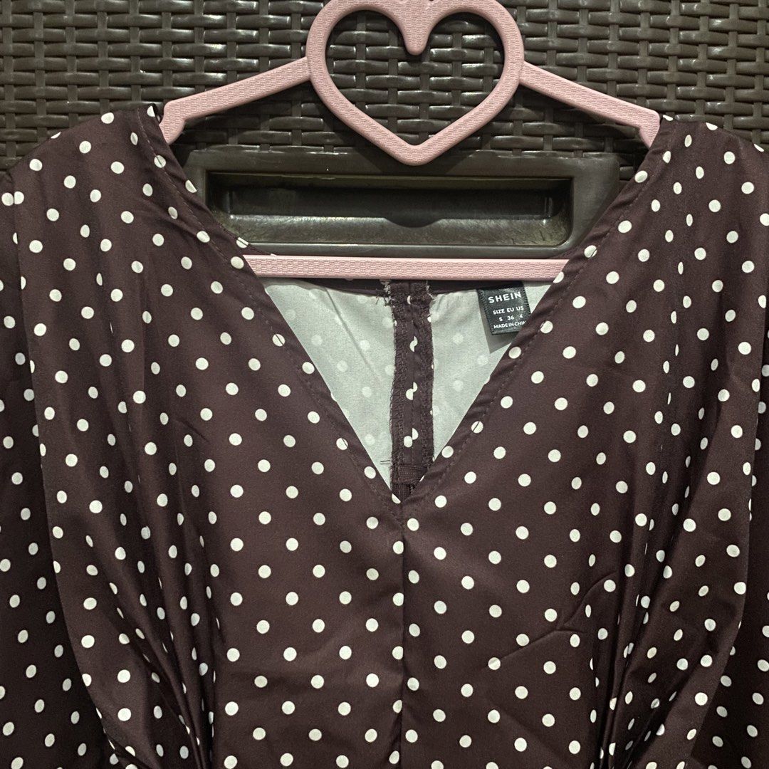 SHEIN Brown Polka Dot V-Neck Blouse (Category: Blouses) located in Tarlac. Submitted by slayyystation (Listing ID 1468904285, Image 2). Description: - Brand/Size: SHEIN Size S (36/4) - Design: Brown with all-over white polka dots - Style: Deep V-neckline, butterfly sleeves, and fitted waist .
