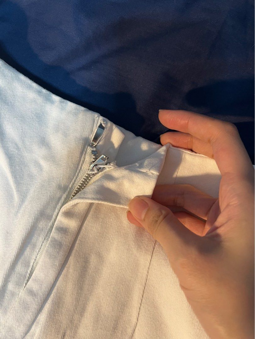 SHEIN White Denim Shorts Size S (Category: Shorts) located in Marikina City. Submitted by yssacee (Listing ID 1468921111, Image 2). Description: - Brand: SHEIN - Size: Small - Color: Clean White - Closure: Front zipper with metal pull, missing clutch - Details: Structured seams on front panels - Condition: Great staple piece, perfect for warm weather and easy to style - pm for more pics - shipping from lower antipolo rizal.