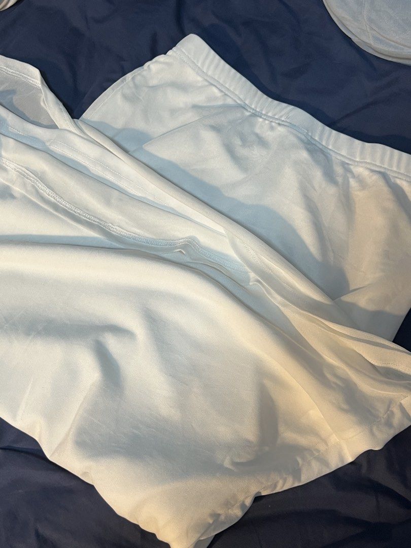 SHEIN White Midi Skirt Size XS (Category: Skirts) located in Marikina City. Submitted by yssacee (Listing ID 1468920910, Image 3). Description: - Brand: SHEIN - Size: XS (US 2) - Material: 95% polyester, 5% elastane (100% polyester lining) - Style: Simple solid color, easy to pair with any top - Condition: Great wardrobe basic - a little transparent, need to wear shorts - shipping from lower antipolo rizal.