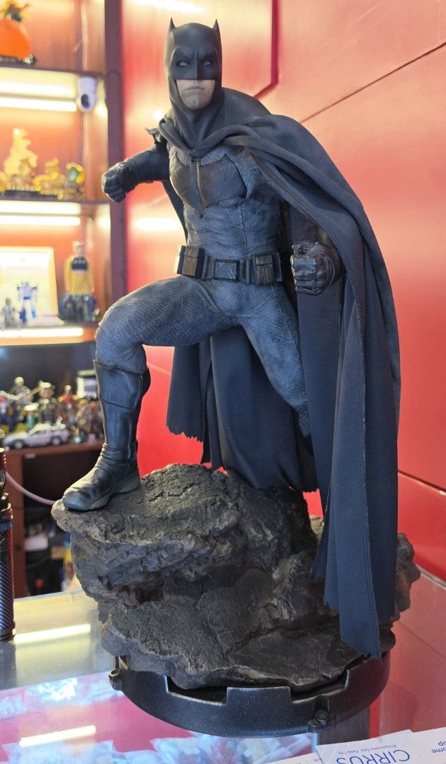 Sideshow Batman V Superman Premium Format Figure Statue 0383/1250 (Category: Figurines & Statues) located in Manila. Submitted by zamgoku (Listing ID 1468781656, Image 1). Description: - Authentic Sideshow Batman v Superman Premium Format Figure - Low edition number: 0383 out of 1250 on the base - Features a highly detailed suit and textured rocky display stand - Condition note: Cape has flaking issues (please check pictures) - Includes statue on