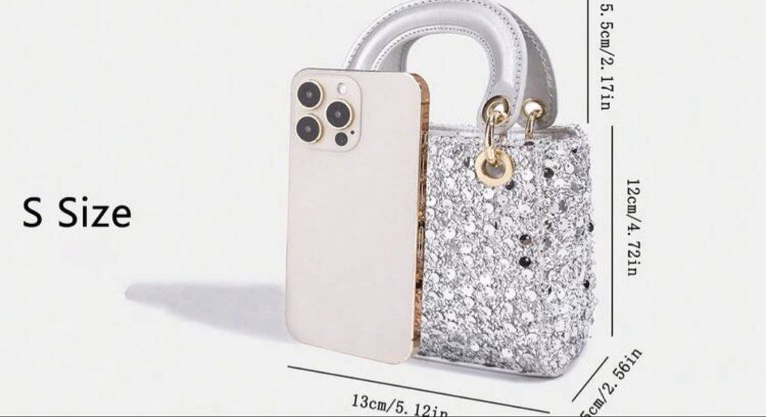 Silver Sequin Mini Handbag with Crossbody Strap S Size (Category: Babies & Kids Fashion) located in Santo Tomas. Submitted by kylejao21 (Listing ID 1468878475, Image 2). Description: - Stunning silver mini handbag covered in sequins and delicate white floral details - Chic gold-toned hardware with a metallic top handle and matching shoulder strap - Compact dimensions: approx. 13cm (L) x 12cm (H) x 6.5cm (W) - Surprisingly spacious: easily fits yo