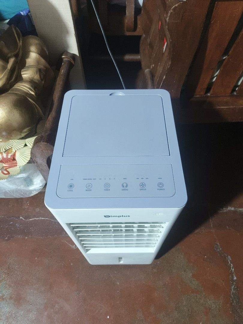 Simplus Air Cooler Fan (Category: Air Conditioning and Heating) located in Quezon City. Submitted by jhaaaaaa (Listing ID 1468797251, Image 2). Description: Simplus 3IN1 Air Cooler 10L Water Tank Advanced Water Cooling Cool / Humidify / Dust Capture. 6months pa lang samin and 3 beses lng nagamit. .