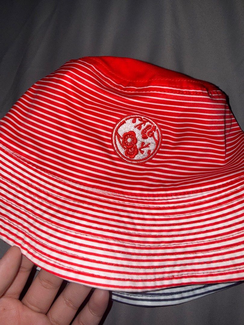 SKOOP REVERSIBLE STRIPED BUCKET HATS (Category: Caps & Hats) located in Las Pinas. Submitted by coolthreadz (Listing ID 1468826358, Image 2). Description: 🧢 SKOOP REVERSIBLE STRIPED BUCKET HATS 🏷️ Brand: Skoop 🎨 Available Colors: Red/White & Navy Blue/White ✨ Condition: Preloved 📦 Sold Separately * Reversible bucket hats featuring a striped exterior and solid-colored reverse side. * Embroidered circular patches on the striped side. * Features