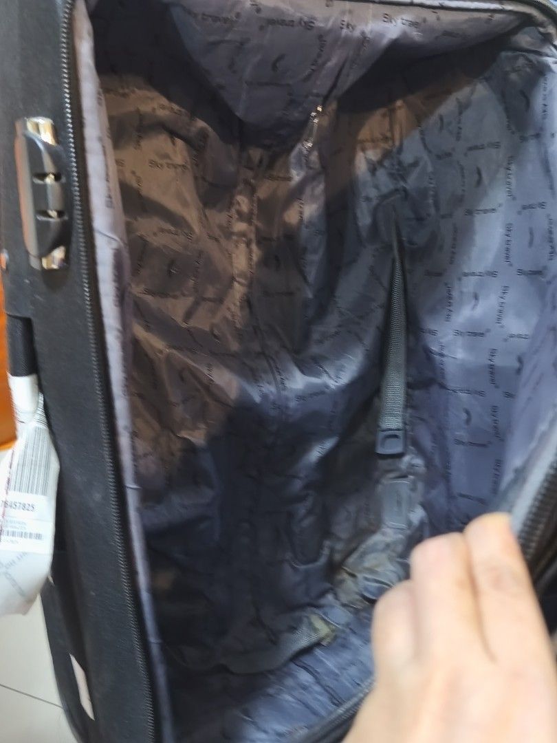 Sky Travel Luggage (Category: Luggage) located in Mandaluyong City. Submitted by bisou_ph2 (Listing ID 1468818966, Image 3). Description: Medium size Check in luggage flaw: Sira yung zipper ng front compartment. needs cleaning last price posted open for pick up or Lalamove Location: Mandaluyong City.