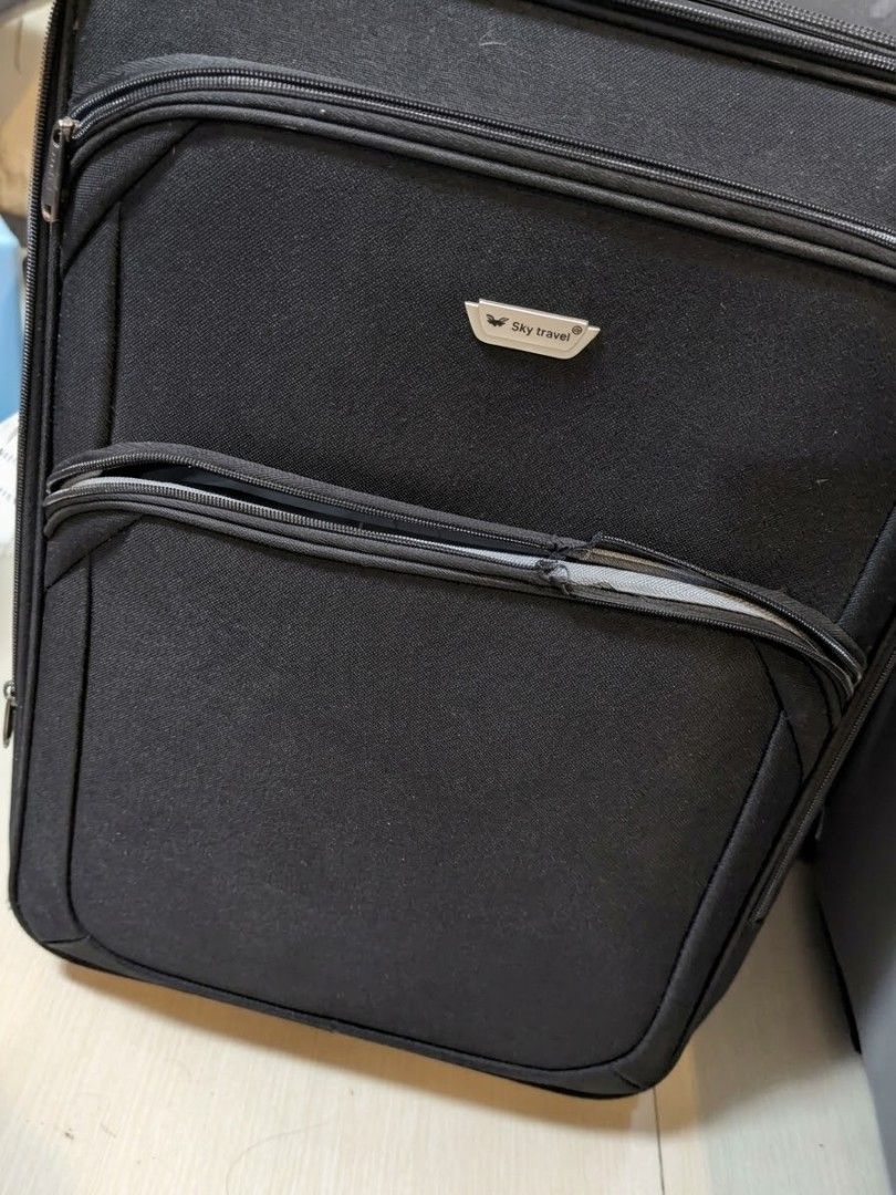 Sky Travel Luggage (Category: Luggage) located in Mandaluyong City. Submitted by bisou_ph2 (Listing ID 1468818966, Image 2). Description: Medium size Check in luggage flaw: Sira yung zipper ng front compartment. needs cleaning last price posted open for pick up or Lalamove Location: Mandaluyong City.