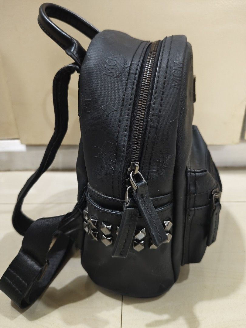 Small backpack (Category: Backpacks) located in Zamboanga. Submitted by ckealia (Listing ID 1468722872, Image 3). Description: mcm backpack with white etiketa/code small size ykk zipper made in korea in good condition expect signs of used.