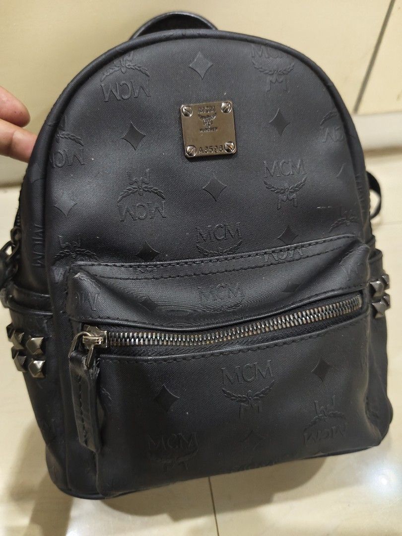 Small backpack (Category: Backpacks) located in Zamboanga. Submitted by ckealia (Listing ID 1468722872, Image 2). Description: mcm backpack with white etiketa/code small size ykk zipper made in korea in good condition expect signs of used.