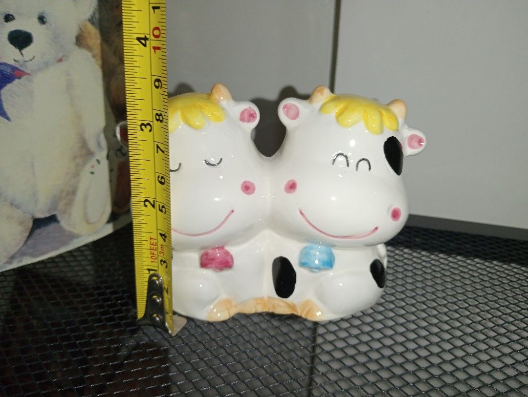 SMALL COW CERAMIC COINBANK (Category: Vases & Decorative Bowls) located in Kawit. Submitted by gieclutter (Listing ID 1468721014, Image 2). Description: Flakers and joy reservers are 𝗻𝗼𝘁 𝗮𝗹𝗹𝗼𝘄𝗲𝗱 Actual photos All sales are final—no returns, exchanges, or refunds 𝗖𝗢𝗡𝗗𝗜𝗧𝗜𝗢𝗡: ・𝗡 ・minor scratches 𝗟𝗢𝗖𝗔𝗧𝗜𝗢𝗡: Kawit, Cavite 𝗠𝗢𝗣: 𝗣𝗙/NO COD Item price + ₱𝟳𝟱 Minimum SF *rates vary based on weight and location 𝗠𝗢𝗗: J&T R