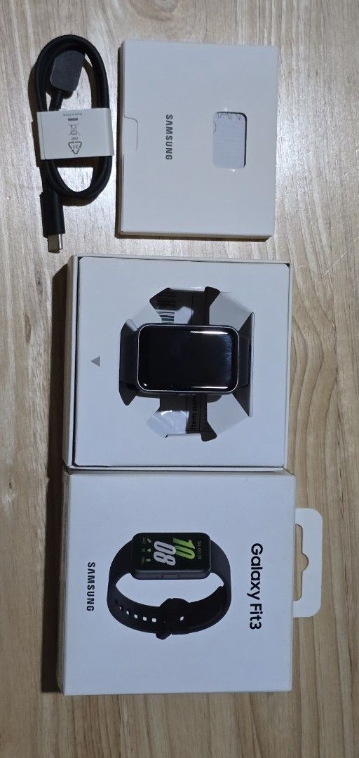 Smart watch (Category: Wearables & Smart Watches) located in Quezon City. Submitted by tindahan_nia (Listing ID 1468851057, Image 2). Description: GET ALL!!! - Brand/Model: Samsung Galaxy Fit3 Smart Watch - Color: Classic Black - Condition: Excellent, well-maintained with original box and accessories included - Features: Fitness tracking, health monitoring, vibrant display, and easy smartphone connectivity - Inclusions: Smart watch, strap, chargi