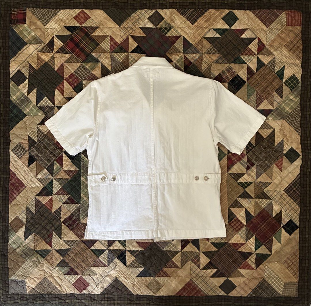 Smith’s HCI Uniform (Category: Tshirts & Polo Shirts ) located in Manila. Submitted by its_ookay.ph (Listing ID 1468736833, Image 2). Description: White button down polo with side pockets, epaulettes and adjusters Tagged M W - 20 L - 25 .