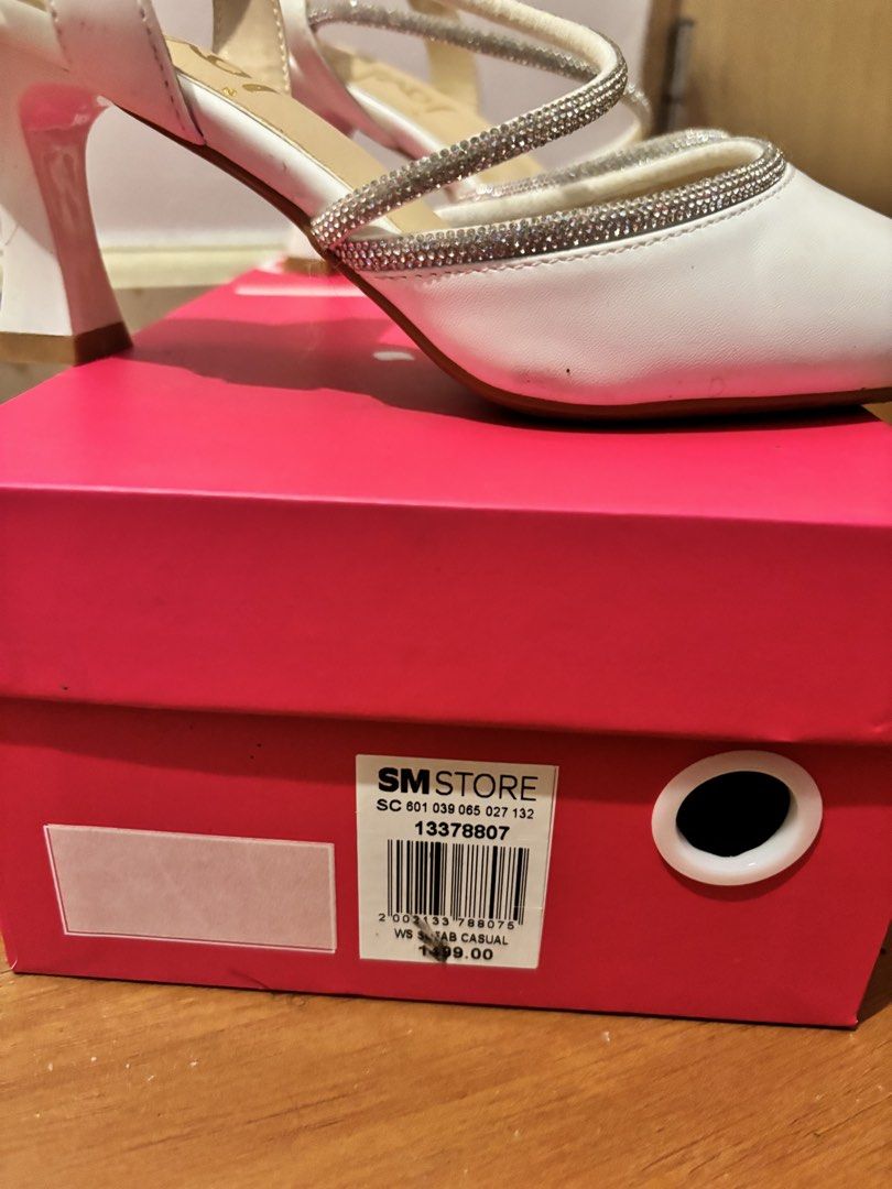 So Fab! White Rhinestone Slingback Heels Size 37 (Category: Heels) located in Manila. Submitted by jas_books (Listing ID 1468811161, Image 3). Description: - Brand: So Fab (Bought from SM Store) - Style: White pointed-toe heels with rhinestone straps and chunky flared heels - Design: Slingback with adjustable buckle - Size: 37 - Used ONCE - Inclusions: Original pink box and price tag (₱1,499.00x) - Price is negotiable.