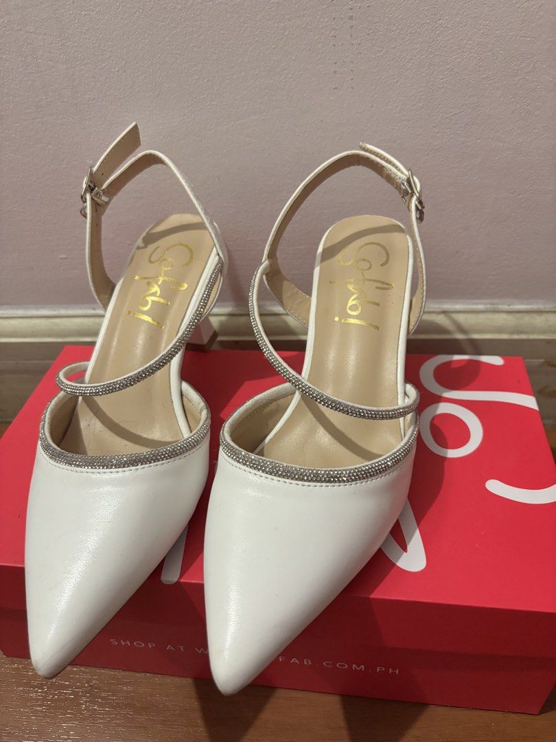 So Fab! White Rhinestone Slingback Heels Size 37 (Category: Heels) located in Manila. Submitted by jas_books (Listing ID 1468811161, Image 1). Description: - Brand: So Fab (Bought from SM Store) - Style: White pointed-toe heels with rhinestone straps and chunky flared heels - Design: Slingback with adjustable buckle - Size: 37 - Used ONCE - Inclusions: Original pink box and price tag (₱1,499.00x) - Price is negotiable.