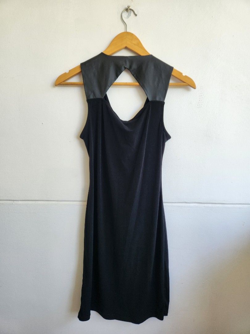 Sofia Vergara Black Bodycon Dress (Category: Dresses) located in Aurora. Submitted by mothere (Listing ID 1468742602, Image 3). Description: - Brand: Sofia Vergara - Size: S - Color: Black - Material: Stretchy fabric (Made in China) - Design details: Faux leather shoulder accents, draped cowl neck, and cutout back - Style: Simple pull-on style, perfect for a night out can fit medium size i'm small but this is still kind loose for me. best siguro 