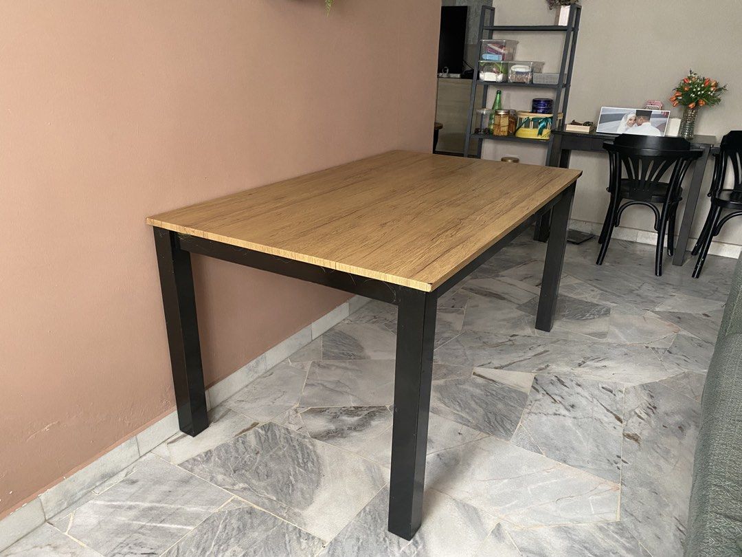 Solid Wood Dining Table (Category: Tables & Sets) located in Kuala Lumpur. Submitted by asyrafazwarrudin93 (Listing ID 1468738342, Image 1). Description: The dining table is likely used. The size of the table is: 150cm x 90cm x 74cm .