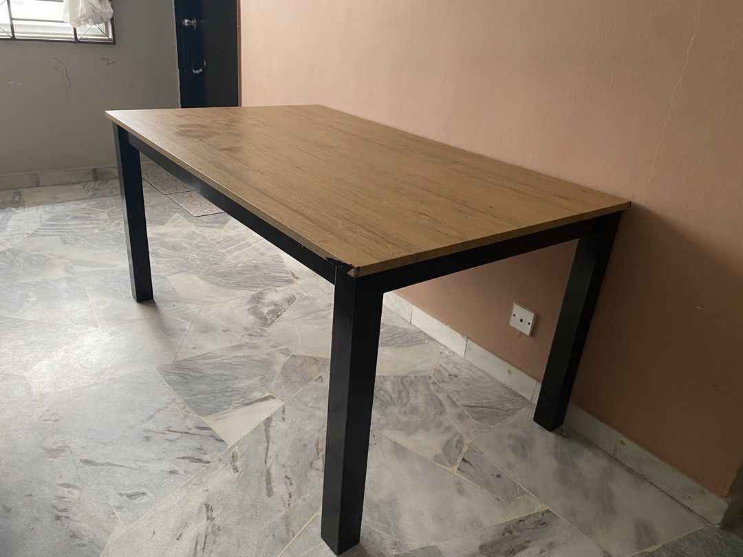 Solid Wood Dining Table (Category: Tables & Sets) located in Kuala Lumpur. Submitted by asyrafazwarrudin93 (Listing ID 1468738342, Image 2). Description: The dining table is likely used. The size of the table is: 150cm x 90cm x 74cm .
