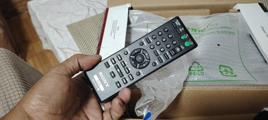 Sony DVP-SR200P CD DVD Player with Remote Control (Category: Blu-Ray & Media Players) located in Manila. Submitted by nikiminmin19779 (Listing ID 1468879208, Image 1). Description: - Model: Sony DVP-SR200P CD DVD Player - Condition: Tested working, excellent shape - Includes: Original remote control, power cable, and plug adapter - Packaging: Still in original plastic wrap and cardboard box - Design: Clean black finish, great compact size for any
