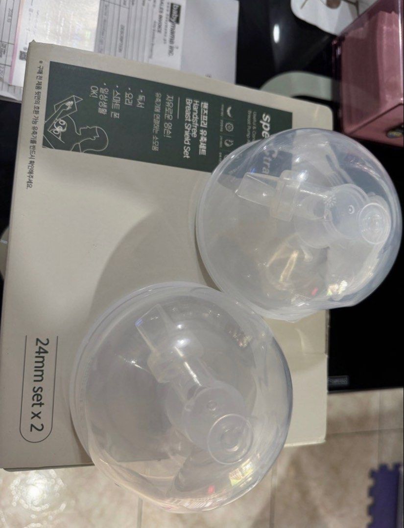 Spectra Handsfree Breast Shield Set 24mm (Category: Breastfeeding & Bottle Feeding) located in Baguio. Submitted by pallas12 (Listing ID 1468788779, Image 1). Description: - Item: Spectra handsfree breast shield set - Size: 24mm - Condition: Brand new, never used, still in original box - Inclusions: Pair of collection cups, user manual, and original Babymama receipt - Purchase Date: October 2023.