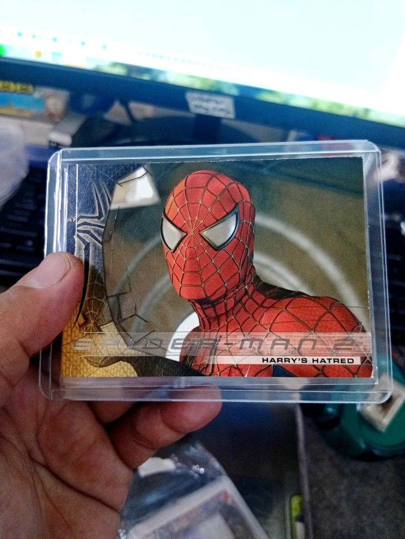 Spider-Man SMC-33 (Category: Raw Singles) located in Manila. Submitted by back_to_the_thrift (Listing ID 1468774418, Image 1). Description: 2004 spiderman 2 comes with toploader and sleeves .