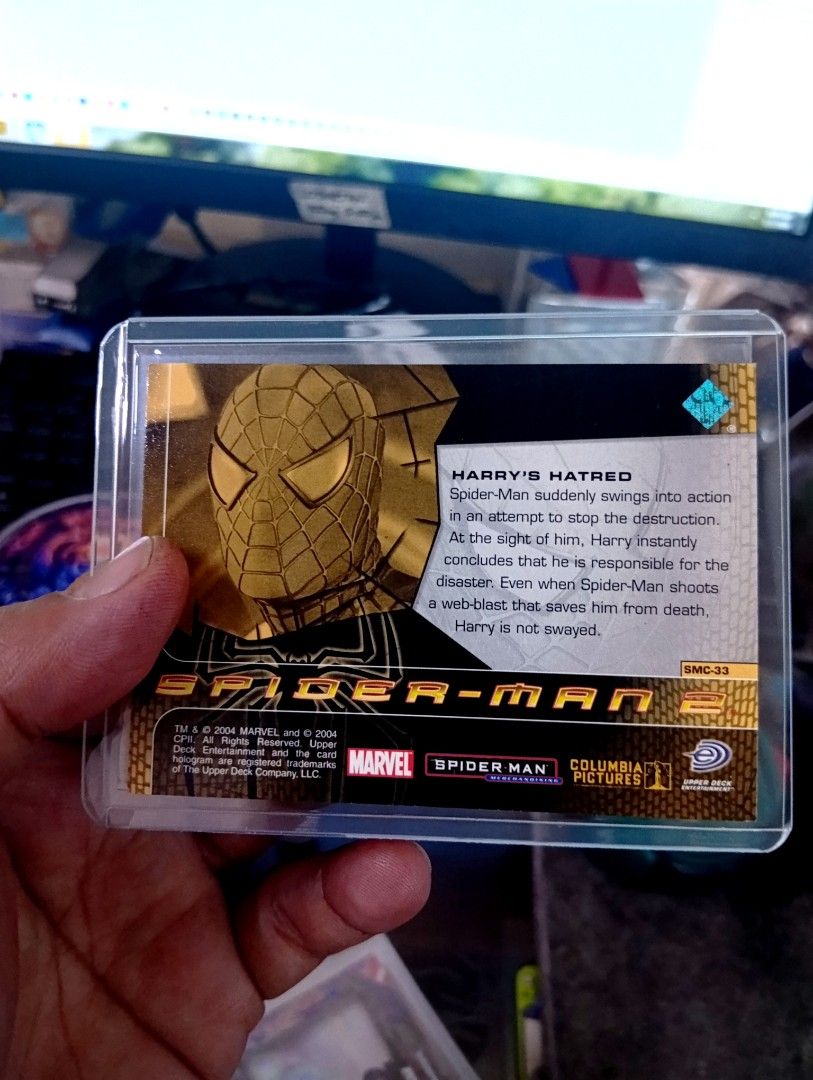 Spider-Man SMC-33 (Category: Raw Singles) located in Manila. Submitted by back_to_the_thrift (Listing ID 1468774418, Image 2). Description: 2004 spiderman 2 comes with toploader and sleeves .