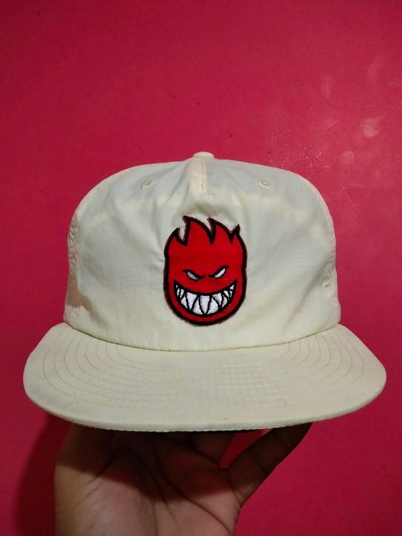 Spitfire Wheels Bighead Embroidered Snapback Hat Off-White Cream (Category: Caps & Hats) located in Mangaldan. Submitted by niftythrifty69 (Listing ID 1468781596, Image 1). Description: - Brand: Spitfire Wheels - Style: Snapback hat / cap - Color: Off-white / cream with red and white Bighead embroidery - Material: 100% recycled nylon - Features: Structured build, flat brim, mesh interior sweatband, adjustable plastic snapback closure - Origin: Ma