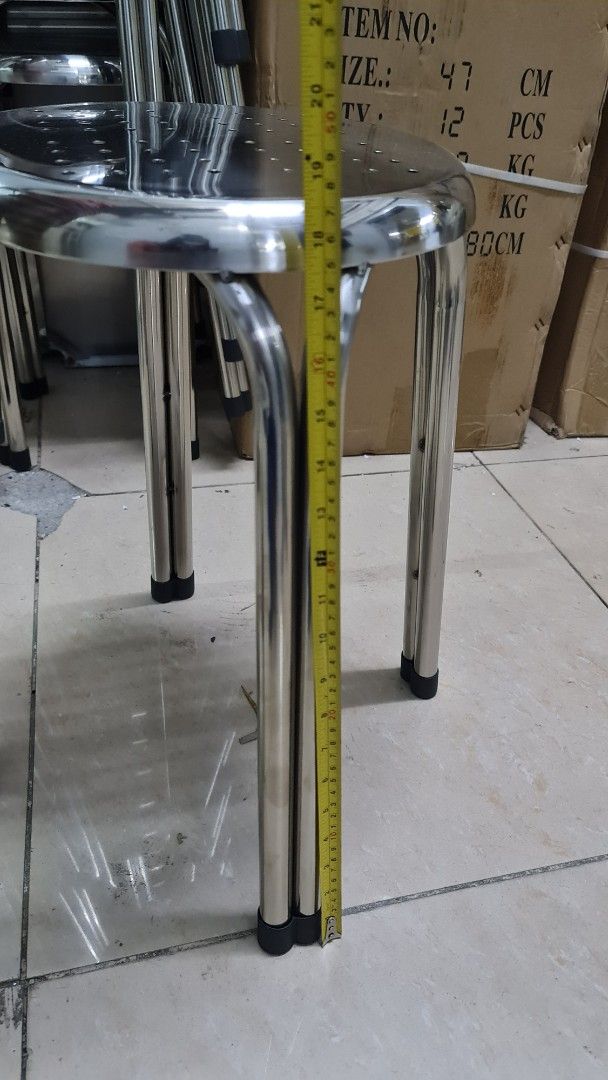Stainless Steel Round Stool with Perforated Seat (Category: Chairs) located in Manila. Submitted by oddcrystal_66a000 (Listing ID 1468821844, Image 1). Description: - Material: Durable stainless steel with a clean silver finish - Height: Approx. 47 cm (refer to tape measure in photos) - Breathable Design: Perforated seat pattern for added comfort - Floor Protection: Metal legs equipped with black rubber tips to prevent scratches - Space-Saving: S