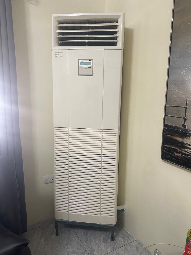 Standing Floor Air Conditioner Unit (Category: Air Conditioning and Heating) located in Caloocan City. Submitted by luzyli1234 (Listing ID 1468749611, Image 1). Description: - Type: Standing floor air conditioner unit 4HP - Color/Finish: Neutral beige with a dark metal stand - Controls: Easy-to-use digital control panel located in the center - Airflow: Large louvered top vents and lower intake grille for efficient cooling - Installation: No windo