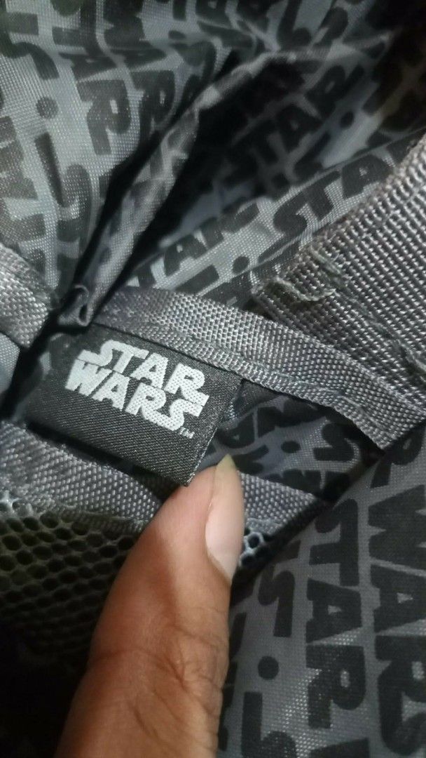 Star Wars Galactic Empire Patches Backpack Blue (Category: Backpacks) located in General Mariano Alvarez. Submitted by markaj1699 (Listing ID 1468917742, Image 3). Description: - Authentic Star Wars backpack with official Lucasfilm tag - Stylish dark blue canvas design with a durable black base - Features iconic patches: Galactic Empire, Darth Vader, and Tie Fighter Squadron - Fun Star Wars all-over print on the inner lining - Secure double buckl
