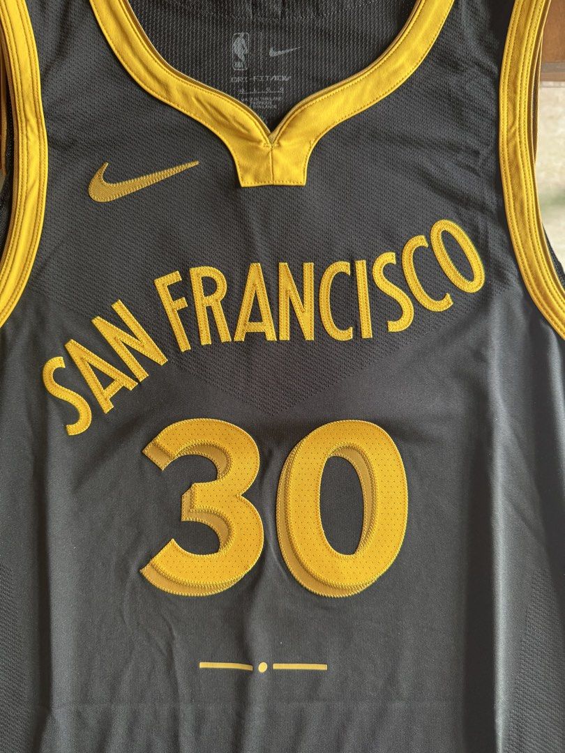 Stephen Curry Golden State Warriors Signed Jersey Size 48 (Category: Activewear) located in Manila. Submitted by inventorey (Listing ID 1468737865, Image 3). Description: - Authentic Stephen Curry signed Golden State Warriors San Francisco city edition jersey (Black & Yellow) - Size 48 (fits like a men's large) - Autographed on the back number 30 graphic - Includes official Beckett witnessed hologram for authentication and USASM - Premium Nike Dr