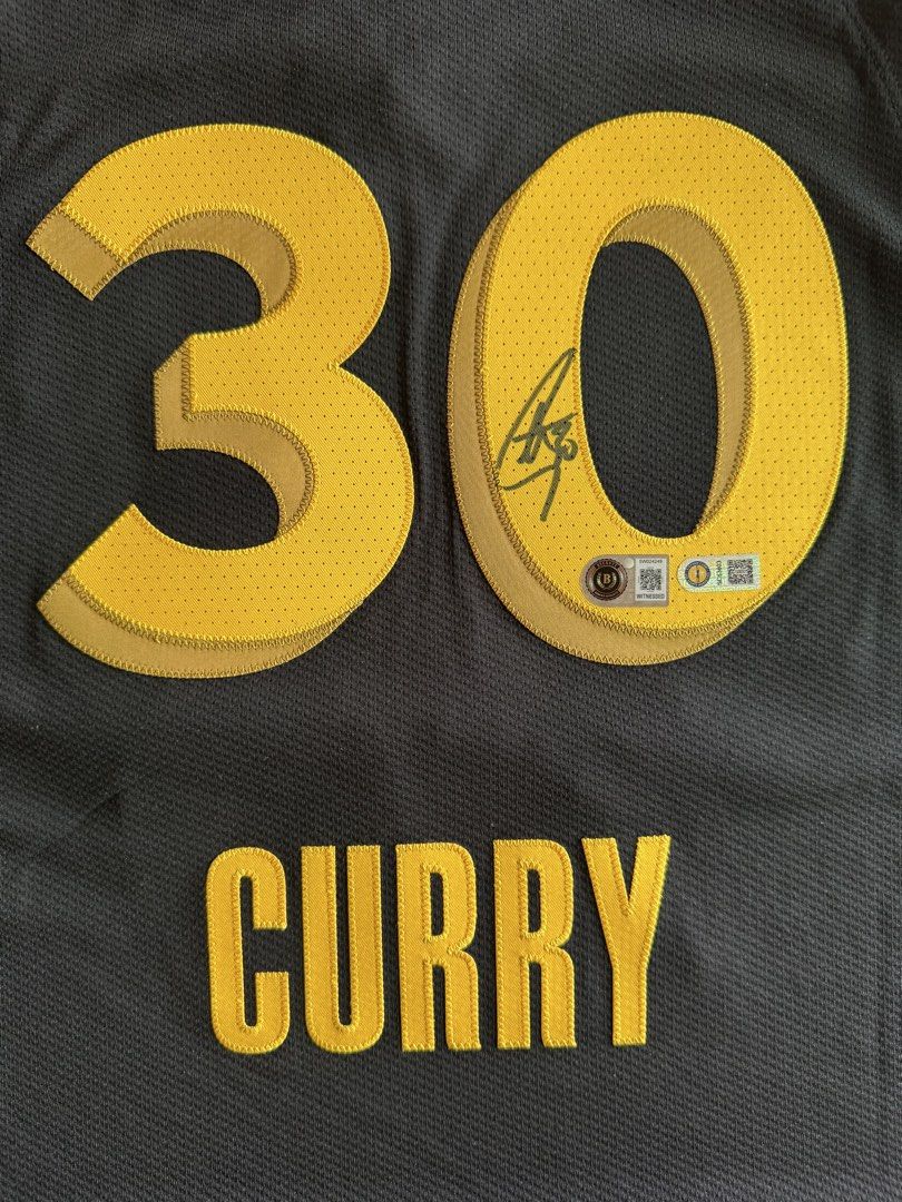 Stephen Curry Golden State Warriors Signed Jersey Size 48 (Category: Activewear) located in Manila. Submitted by inventorey (Listing ID 1468737865, Image 1). Description: - Authentic Stephen Curry signed Golden State Warriors San Francisco city edition jersey (Black & Yellow) - Size 48 (fits like a men's large) - Autographed on the back number 30 graphic - Includes official Beckett witnessed hologram for authentication and USASM - Premium Nike Dr
