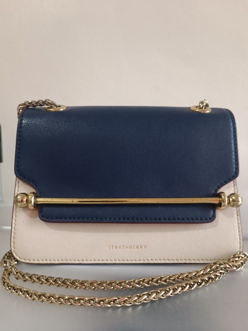 Strathberry east west bag (Category: Luxury Bags & Wallets) located in Paranaque City. Submitted by earlylux (Listing ID 1468789522, Image 1). Description: Please inspect photos for signs of usage/flaw No inclusions! Normal signs of usage please manage your expectations you're buying a secondhand bag. Pm for more details No return, no refund, no exchange, no cancellation! First to pay Joy miners will be blocked! MOP: Payment first gcash MOD: J&T 