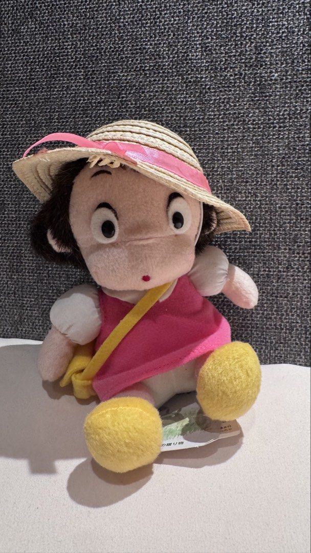Studio Ghibli Chibi Maruko-chan Plush Doll Straw Hat (Category: Plushies & Soft Toys) located in Mandaluyong City. Submitted by maelovestoshop (Listing ID 1468879875, Image 1). Description: - Character: Studio Ghibli plush doll - Size: Approximately 20cm tall - Outfit & Accessories: Pink dress, straw hat with ribbon, yellow shoes, and attached cross-body bag - Condition: Clean fabric, no stains, no damage - Authenticity: Original Japanese tag att