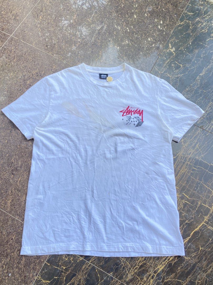 STUSSY DICE (Category: Tshirts & Polo Shirts ) located in Aloran. Submitted by thriftnijep.04 (Listing ID 1468738327, Image 1). Description: Excellent Condition Fresh from bale Dimes: 21 x 28 Medium on tag Issue: Washable stain fresh from bale Color rate: 9/10.