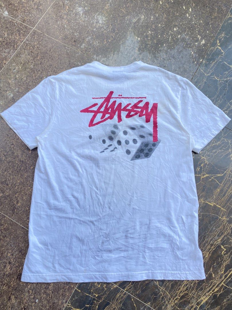 STUSSY DICE (Category: Tshirts & Polo Shirts ) located in Aloran. Submitted by thriftnijep.04 (Listing ID 1468738327, Image 2). Description: Excellent Condition Fresh from bale Dimes: 21 x 28 Medium on tag Issue: Washable stain fresh from bale Color rate: 9/10.