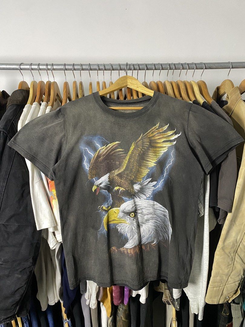 Sun faded American eagle Thunder Graphic (Category: Formal Shirts) located in Trece Martires City. Submitted by ridgeridethrift (Listing ID 1468764255, Image 1). Description: Width - 21 Length - 29 Sun faded & have multiple pin hole.